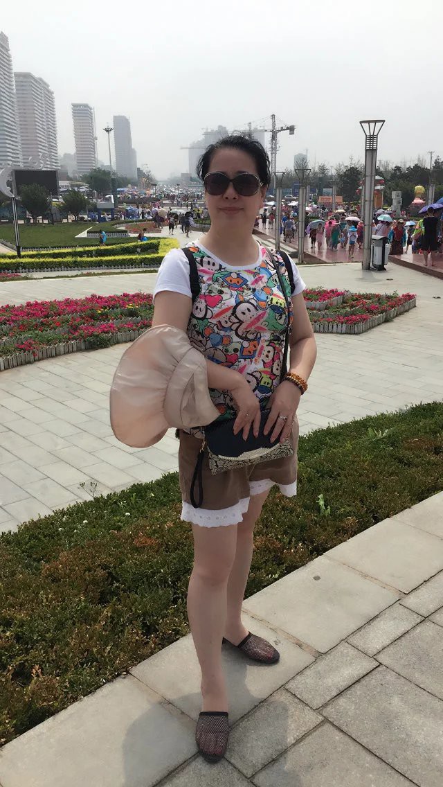 魅力女人唱民歌的图片