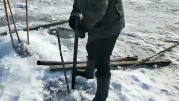 打冰洞起网